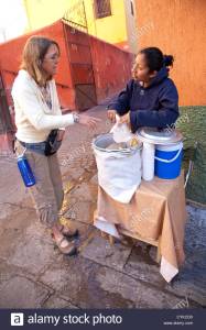Source-_Alamy stock_north-america-mexico-guanajuato-state-guanajuato-woman-buying-hot-CYKCD0